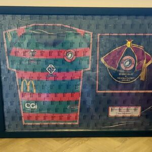 Shirt, Honours cap, and plaque frame - Black and red mount, Plain Black frame
